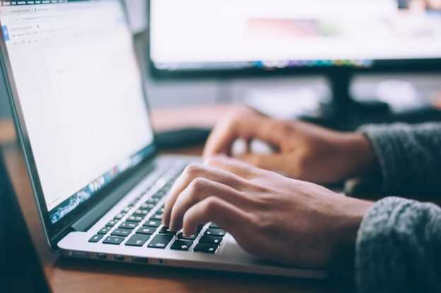 man working on a computer